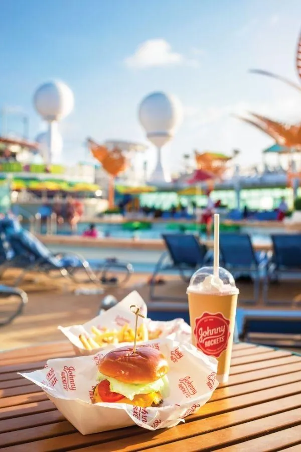Johnny Rockets meal beside a Royal Caribbean pool deck
